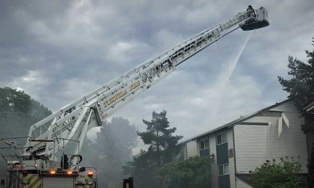 Firefighters battle blaze at unoccupied apartment building in Tukwila Thursday morning