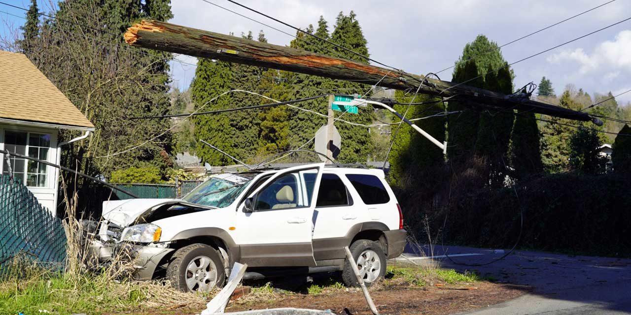 Vehicle crashes into utility poles, knocks out power in Tukwila Wed. afternoon